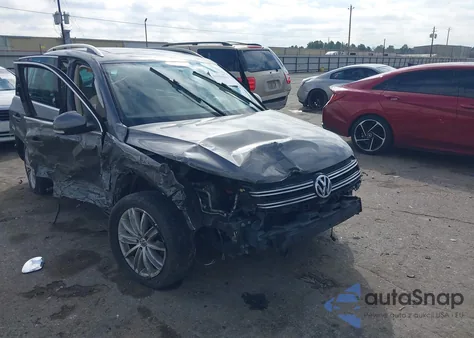 2014 Volkswagen Tiguan Sel z USA, uszkodzony, nr VIN WVGAV3AX3EW510426